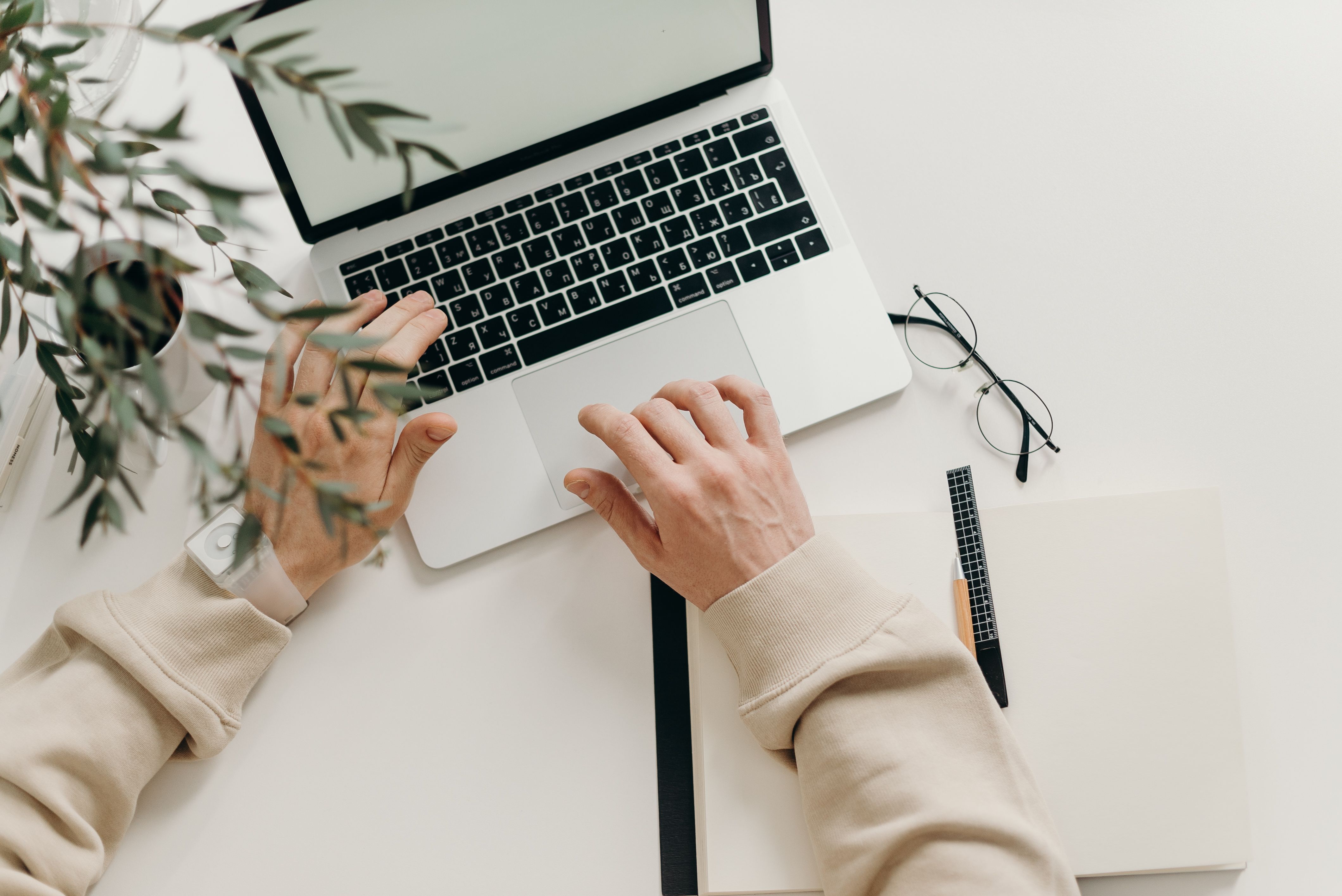 Student writing scholarship essay at desk